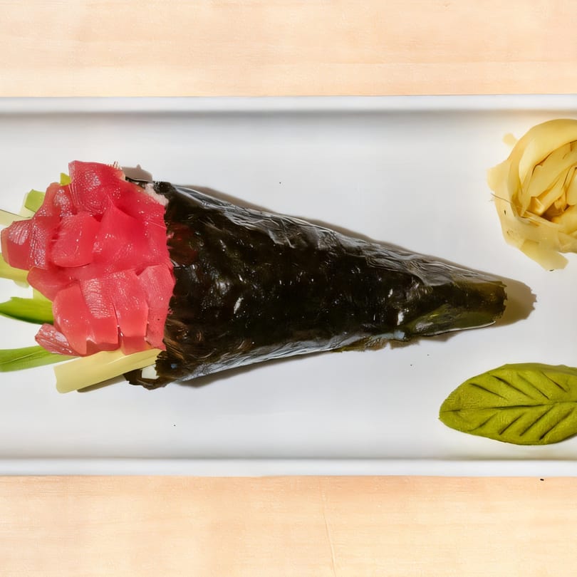 Sushi Go's tuna hand roll with avocado, ginger, and a leaf-shaped dollop of wasabi.